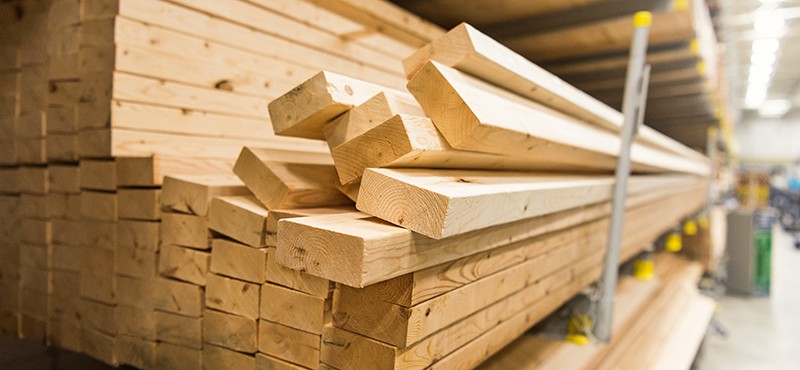 stacks of lumber in the building materials department