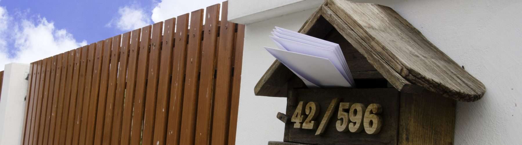 a mailbox mounted on a wall