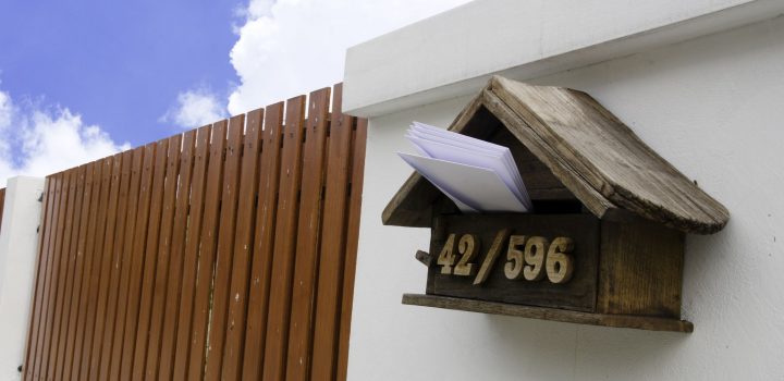 a mailbox mounted on a wall