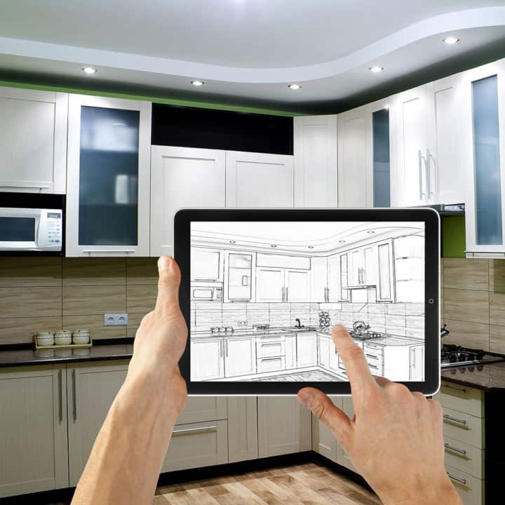 kitchen design on ipad in front of real kitchen