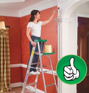 lady painting trim while on a ladder