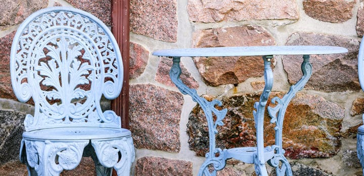 Blue metal outdoor furniture painted with spray paint