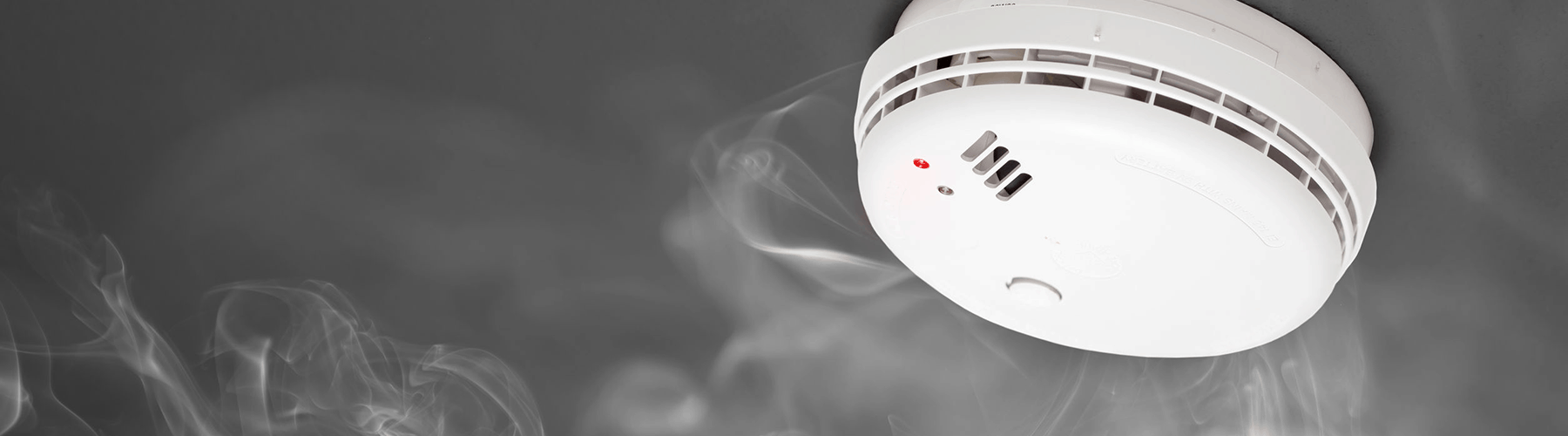 fire safety - smoke alarm detecting white smoke