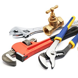 various type of plumbing tools against white background