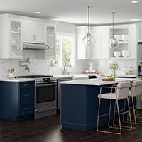 white and blue kitchen cabinets with island, open shelving and stove