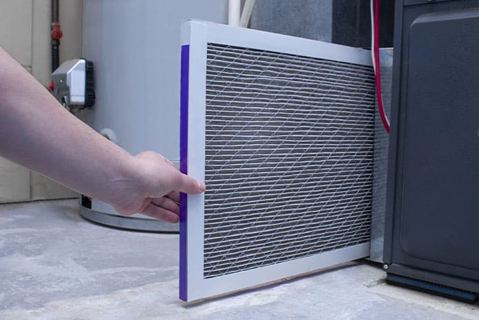 changing a dirty furnace filter